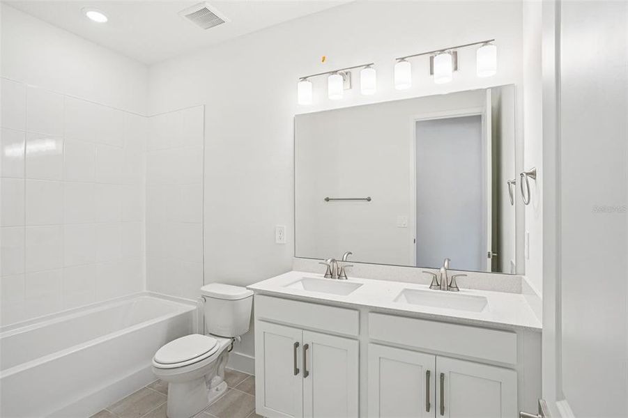 Furnished interior view inside a new home in Ridgehaven - Signature Series, Ormond Beach (Image 12).