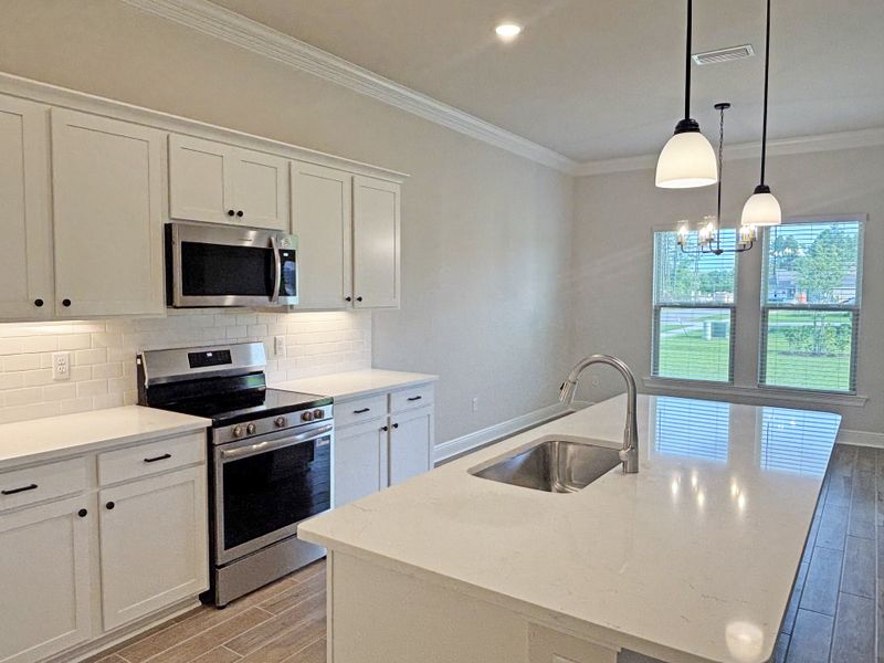 Furnished interior view inside a new home in Bird Song at Hammock Bay, Freeport (Image 9).