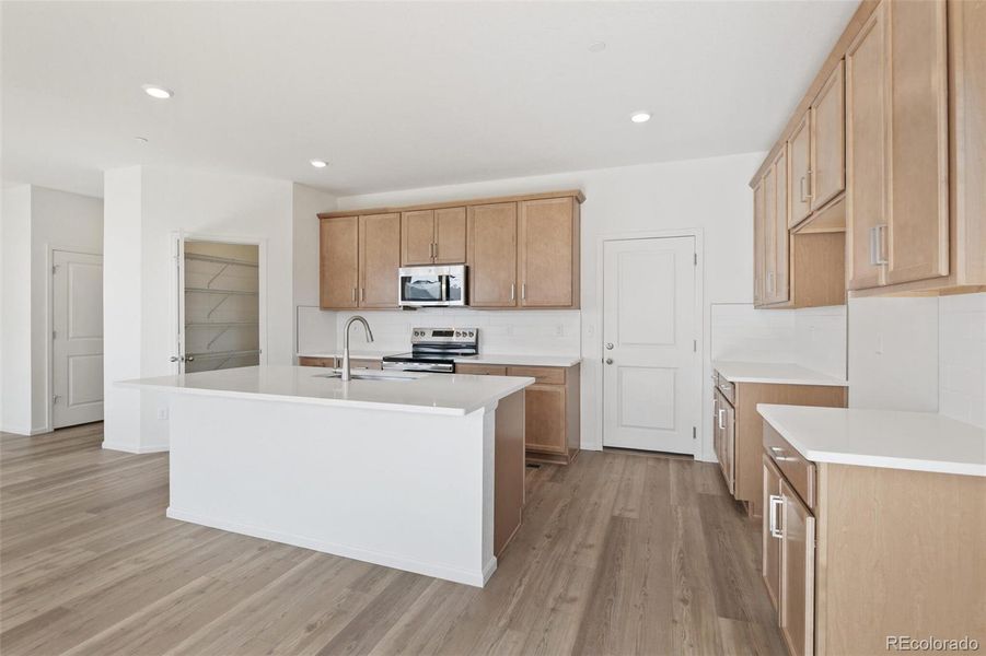 Furnished interior view inside a new home in Turnberry, Commerce City (Image 6).