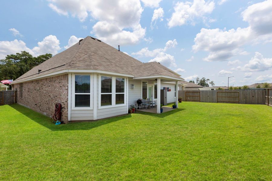 Front exterior of a new home in Moran Ranch, Willis, TX, highlighting curb appeal (Image 21). Front exterior of a new home in Moran Ranch, Willis, TX, highlighting curb appeal (Image 21).