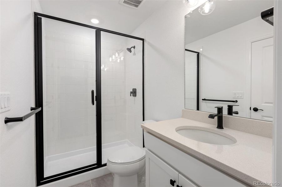 Furnished interior view inside a new home in Woodrose at Painted Prairie, Aurora (Image 9).