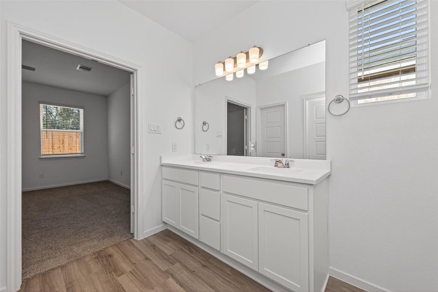 Furnished interior view inside a new home in Enclave at Willis, Willis (Image 12).