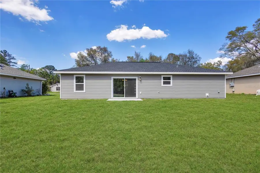 Exterior details and patio area of a home in , Belleview (Image 19).