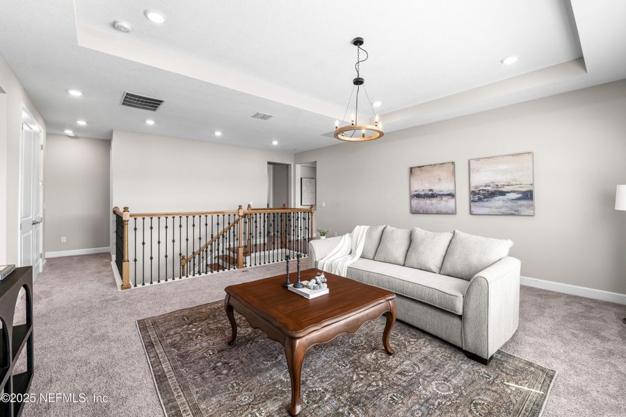 Furnished interior view inside a new home in The Cove at Beachwalk, St. Johns (Image 3). Furnished interior view inside a new home in The Cove at Beachwalk, St. Johns (Image 3).