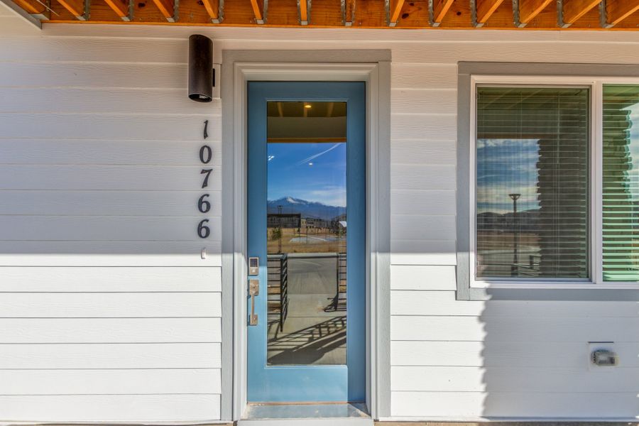 Exterior details and patio area of a home in Parkside at Victory Ridge, Colorado Springs (Image 21).