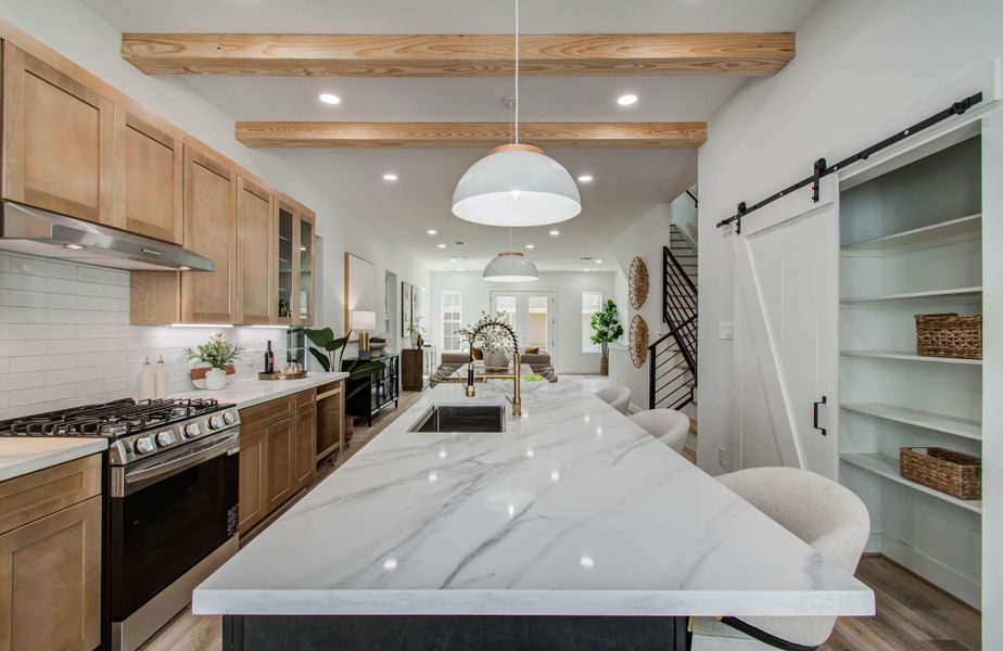 Generous pantry with smart Barn door.