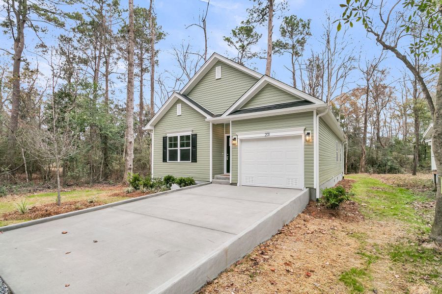 Front exterior of a new home in , Summerville, SC, highlighting curb appeal (Image 26).