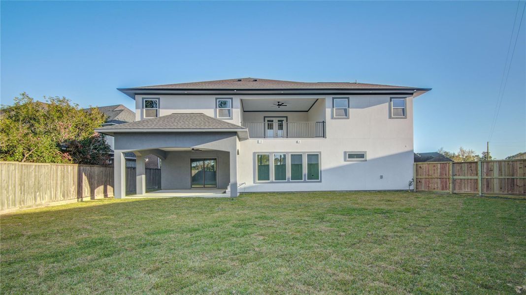 Exterior details and patio area of a home in , Houston (Image 3).