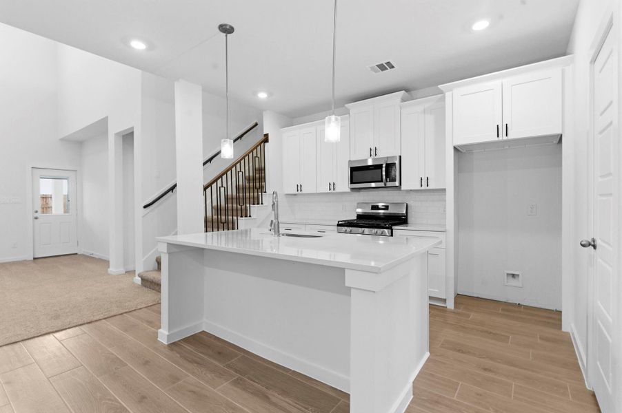 Furnished interior view inside a new home in , Iowa Colony (Image 10).