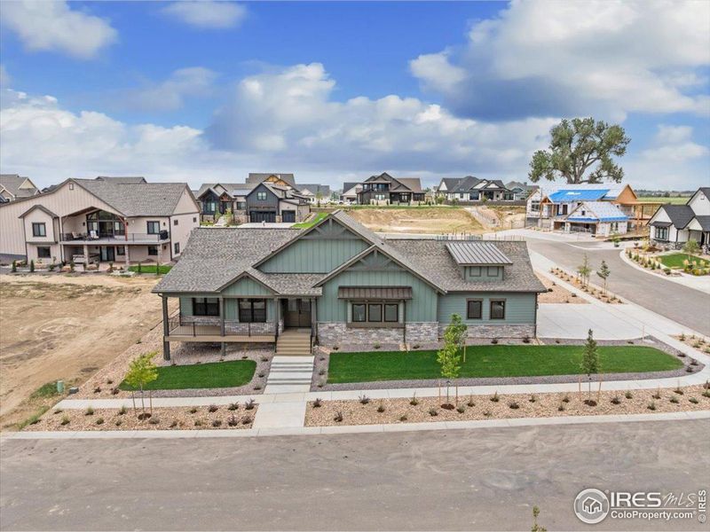 Front exterior of a new home in , Berthoud, CO, highlighting curb appeal (Image 26).