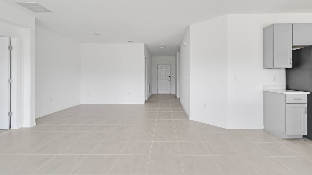 Representative unfurnished interior of a home built from the Ambrosia by Taylor Morrison in Aden South at Westview, Kissimmee (Image 14).