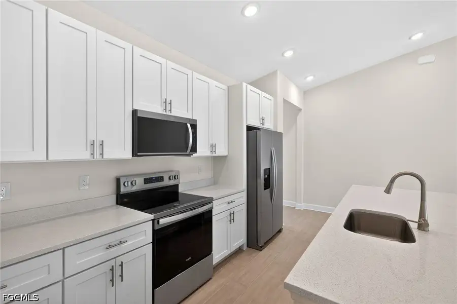 Furnished interior view inside a new home in Cape Coral, Cape Coral (Image 6).