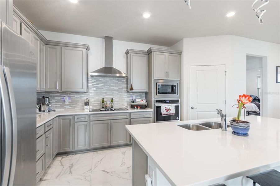 Furnished interior view inside a new home in Tohoqua Reserve, Kissimmee (Image 12).