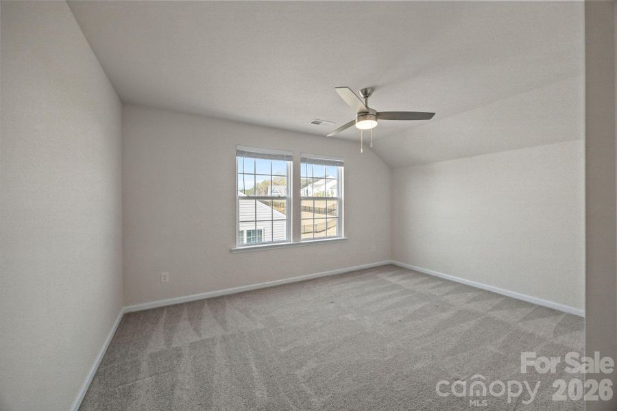 UPSTAIRS Bedroom #3 with walk in closet and entry to upstairs bathroom. Privacy! Perfect for many living situations.  Roomy and comfortable.