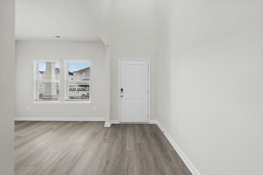 Spacious, unfurnished interior of a new home in Waterside - Coastline Series, Longs (Image 12).