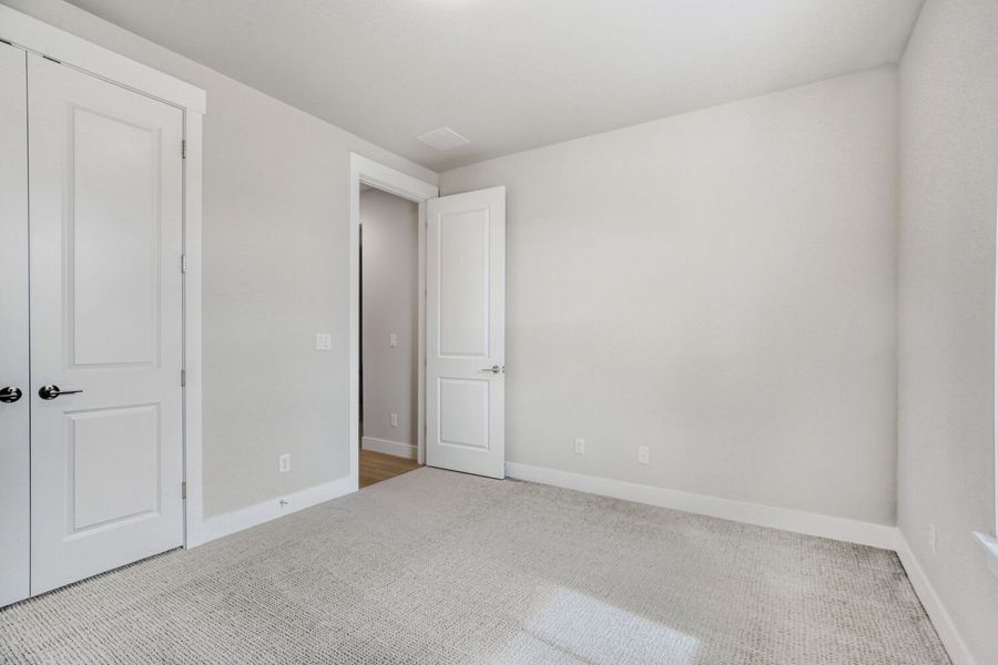 Spacious, unfurnished interior of a new home in RainDance, Windsor (Image 20).