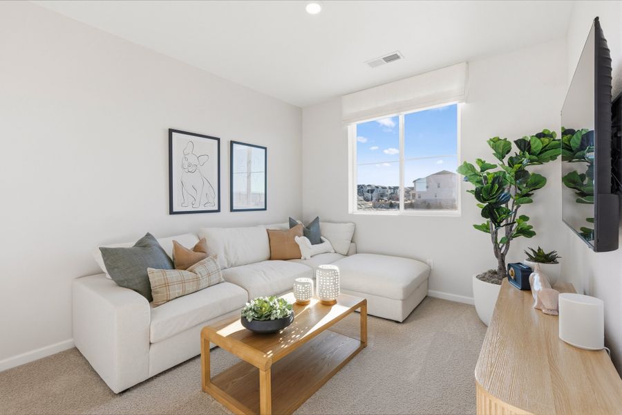 Representative furnished interior of a home built from the 4904 by Risewell Homes in The Aurora Highlands, Aurora (Image 22).