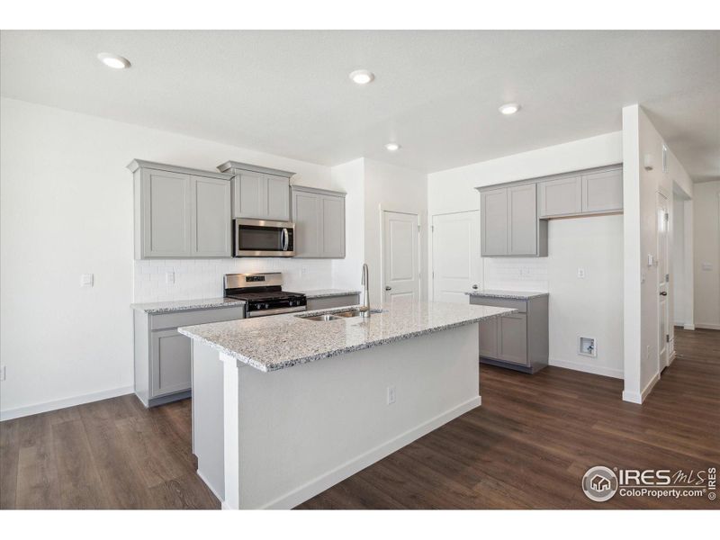 Furnished interior view inside a new home in Westgate, Greeley (Image 7).