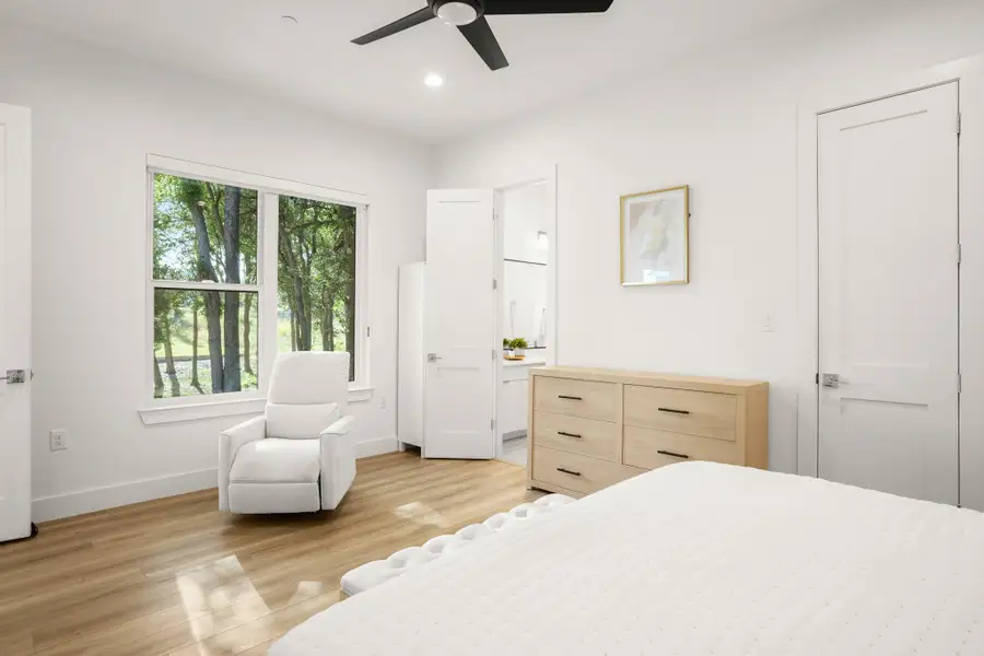 Fantastic bedroom floor plan with a secluded main floor primary retreat with tree filled views. Fantastic bedroom floor plan with a secluded main floor primary retreat with tree filled views.