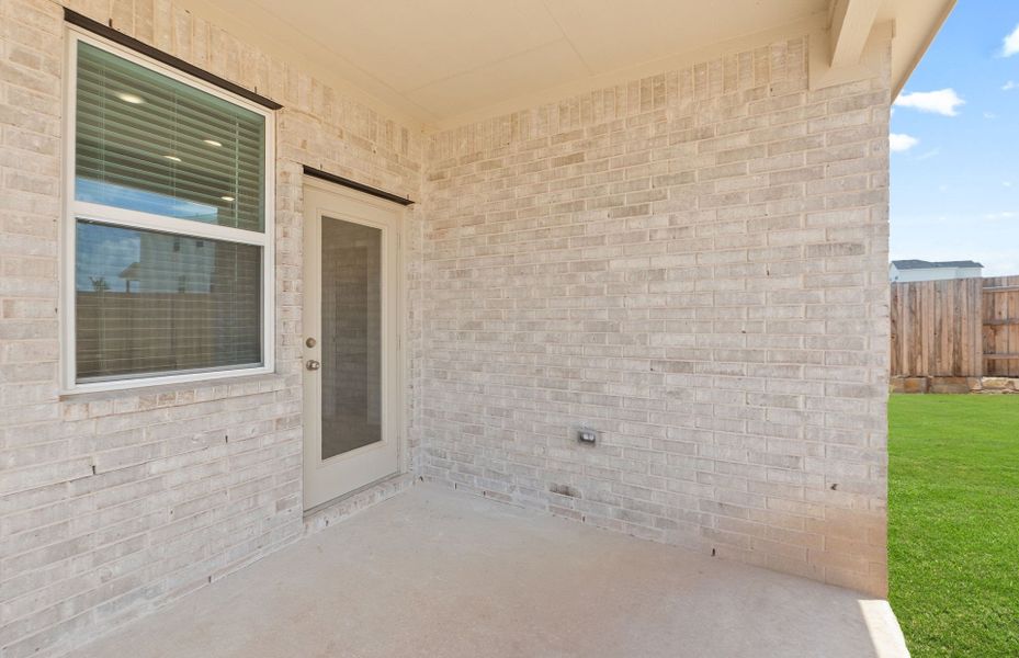 Exterior details and patio area of a home in Sunfield, Buda (Image 4). Exterior details and patio area of a home in Sunfield, Buda (Image 4).