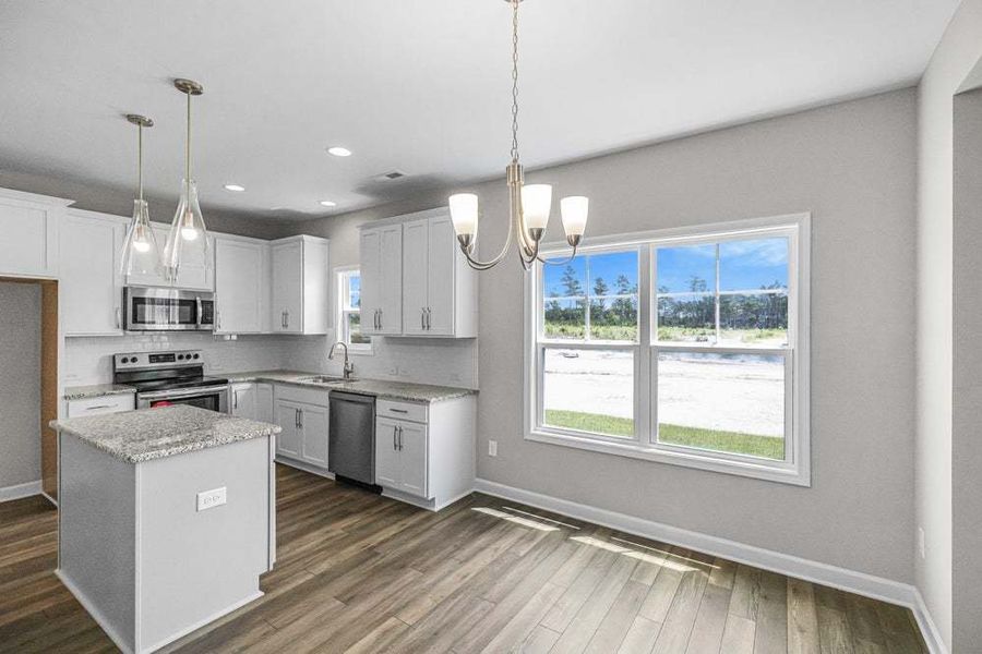 Representative furnished interior of a home built from the Magnolia by Caviness & Cates Communities in Bartlett Manor, Youngsville (Image 45).