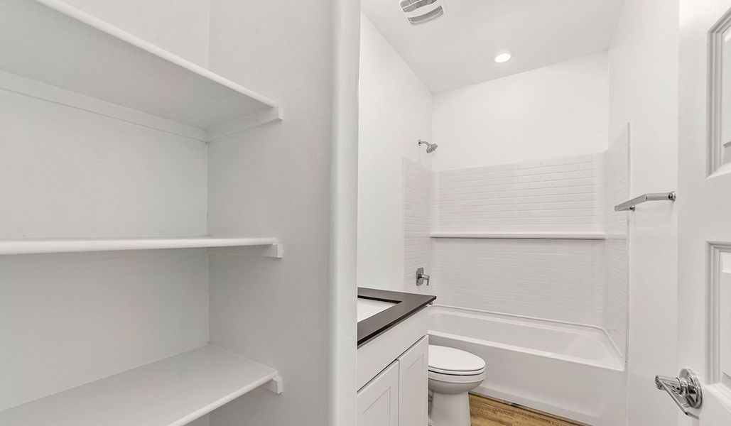 Representative furnished interior of a home built from the Dalea by D.R. Horton in Barnett Village, Marana (Image 12).