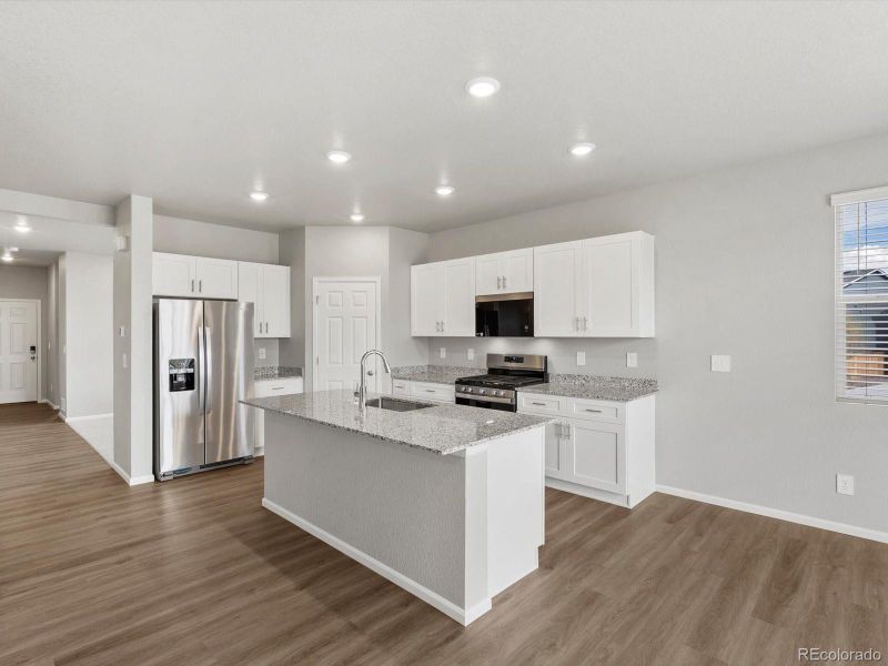 Furnished interior view inside a new home in Ridgeline Vista: The Flora Collection, Brighton (Image 6). Furnished interior view inside a new home in Ridgeline Vista: The Flora Collection, Brighton (Image 6).