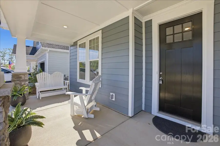 Exterior details and patio area of a home in The Terraces at Cramerton Mills, Cramerton (Image 3).