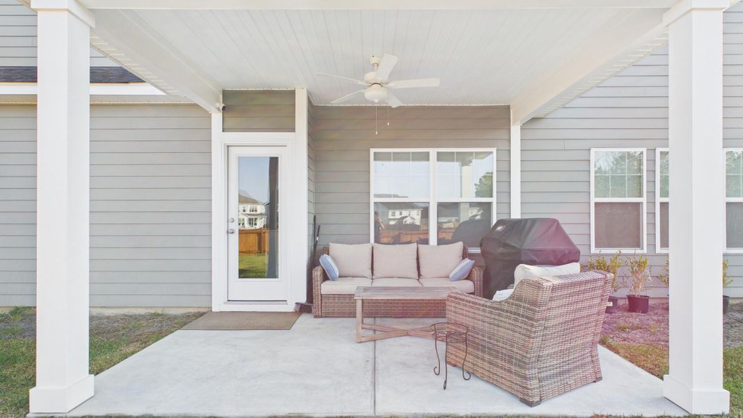 Exterior details and patio area of a home in Hewing Farms, Summerville (Image 30).
