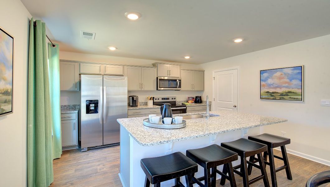 Furnished interior view inside a new home in Wildbrook Village, Waynesville (Image 3). Furnished interior view inside a new home in Wildbrook Village, Waynesville (Image 3).