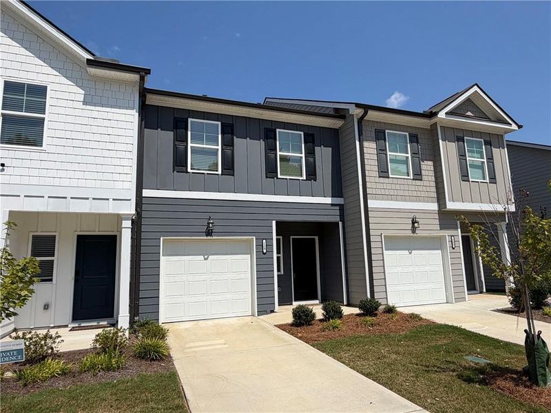 Front exterior of a new home in , Hoschton, GA, highlighting curb appeal (Image 2). Front exterior of a new home in , Hoschton, GA, highlighting curb appeal (Image 2).