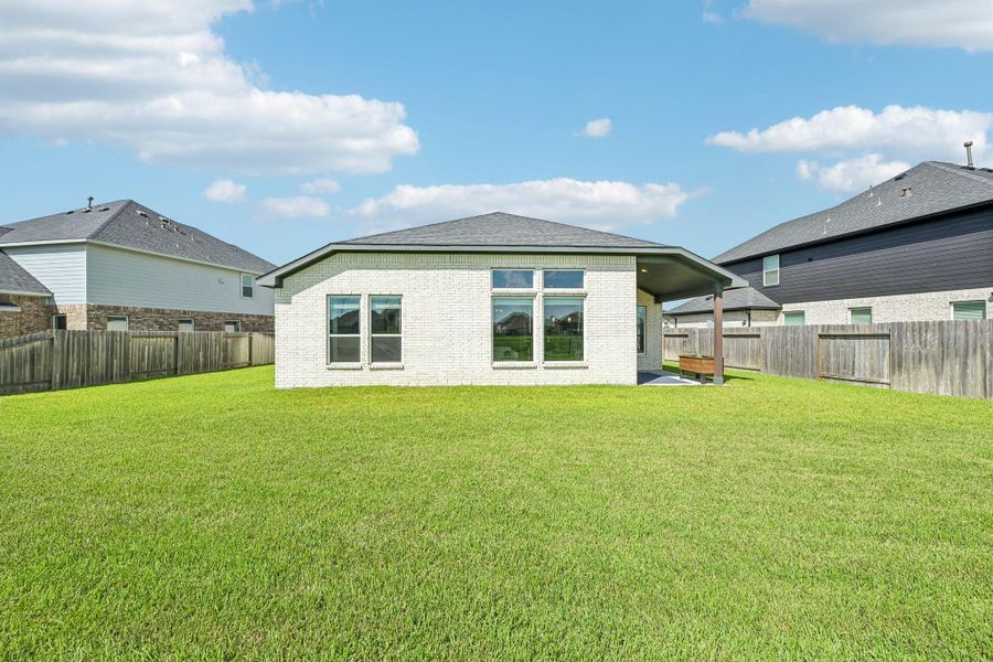 Exterior details and patio area of a home in , Alvin (Image 26). Exterior details and patio area of a home in , Alvin (Image 26).