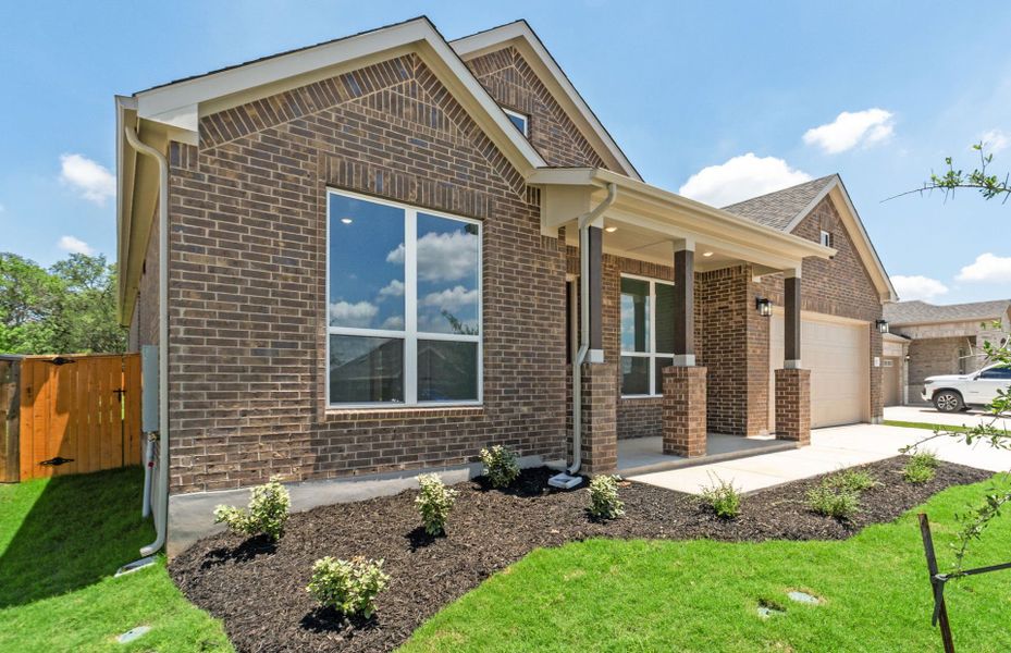 Exterior details and patio area of a home in 6 Creeks, Kyle (Image 30).