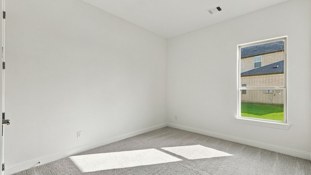 Furnished interior view inside a new home in Green Meadows Classic, Celina (Image 14).