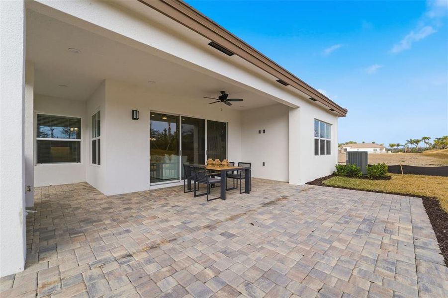 Exterior details and patio area of a home in Valencia Ridge, Wesley Chapel (Image 22).