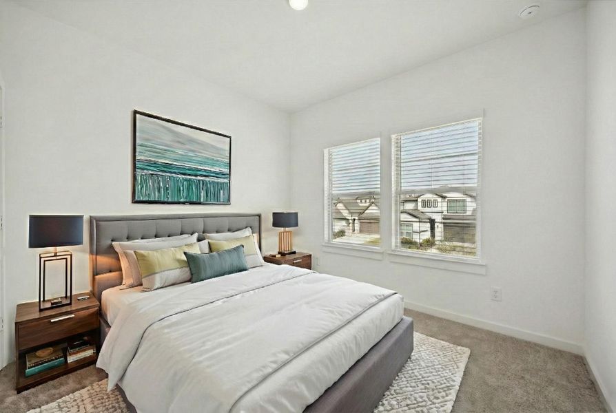 BEDROOM 4 OFFERS LARGE DOUBLE WINDOWS OVERLOOKING THE NEIGHBORHOOD. **Virtually staged.