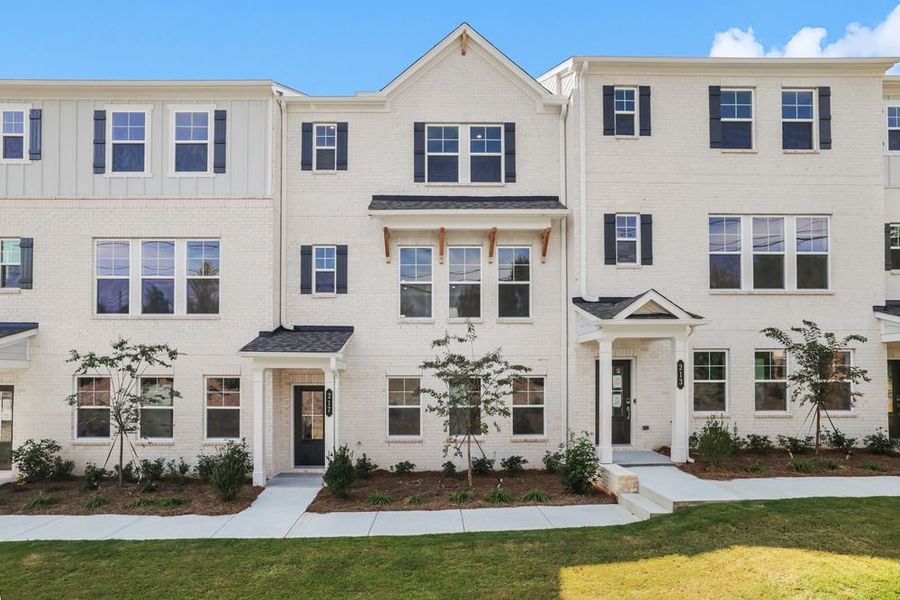 Front exterior of a new home in Somerset at Veterans Memorial, Mableton, GA, highlighting curb appeal (Image 1).