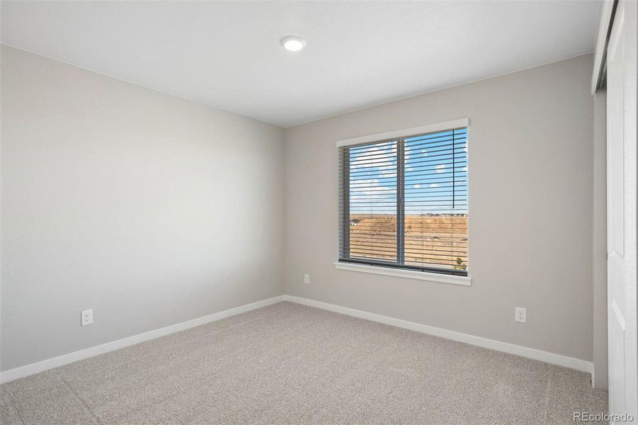 Spacious, unfurnished interior of a new home in Second Creek Farm, Commerce City (Image 12).