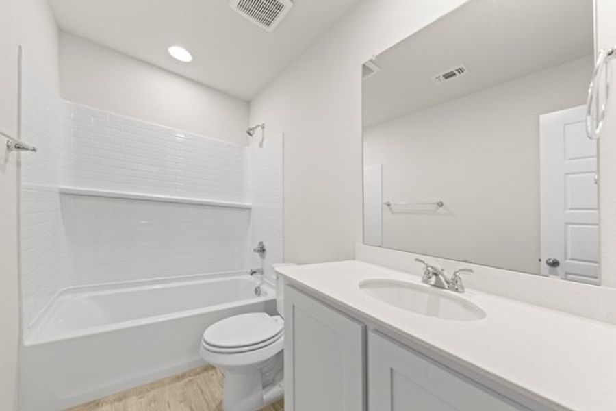 Front exterior of a new home in Sanger Circle, Sanger, TX, highlighting curb appeal (Image 23). Front exterior of a new home in Sanger Circle, Sanger, TX, highlighting curb appeal (Image 23).