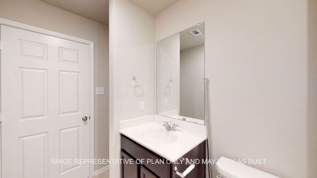Representative furnished interior of a home built from the Texas Cali by D.R. Horton in Reynolds Crossing, Killeen (Image 25).