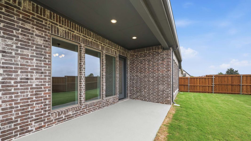 Exterior details and patio area of a home in Lakewood Village, Lakewood Village (Image 4). Exterior details and patio area of a home in Lakewood Village, Lakewood Village (Image 4).