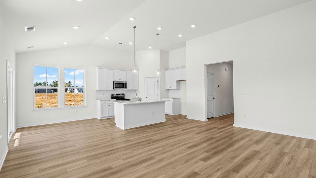 A bright, welcoming view of the Easton kitchen and living area in Chestnut Farms A bright, welcoming view of the Easton kitchen and living area in Chestnut Farms