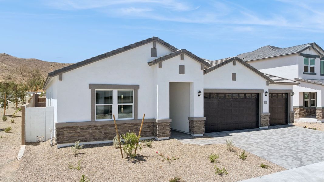 Representative exterior photo of a completed home built from the Willow by D.R. Horton in The Ridge at Stone Butte, Phoenix, AZ (Image 29). Representative exterior photo of a completed home built from the Willow by D.R. Horton in The Ridge at Stone Butte, Phoenix, AZ (Image 29).