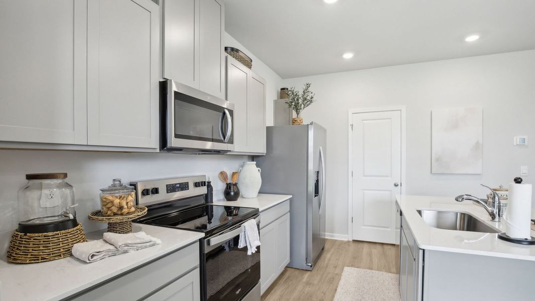 Furnished interior view inside a new home in River Landing Townhomes, Murfreesboro (Image 14).