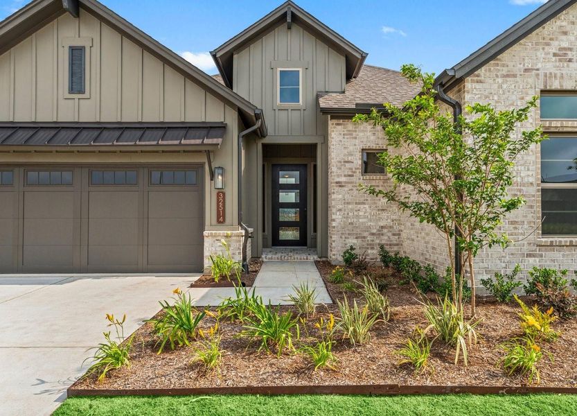 Front exterior of a new home in , Fulshear, TX, highlighting curb appeal (Image 2).