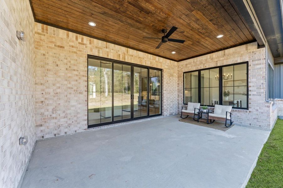 Exterior details and patio area of a home in , Conroe (Image 3).