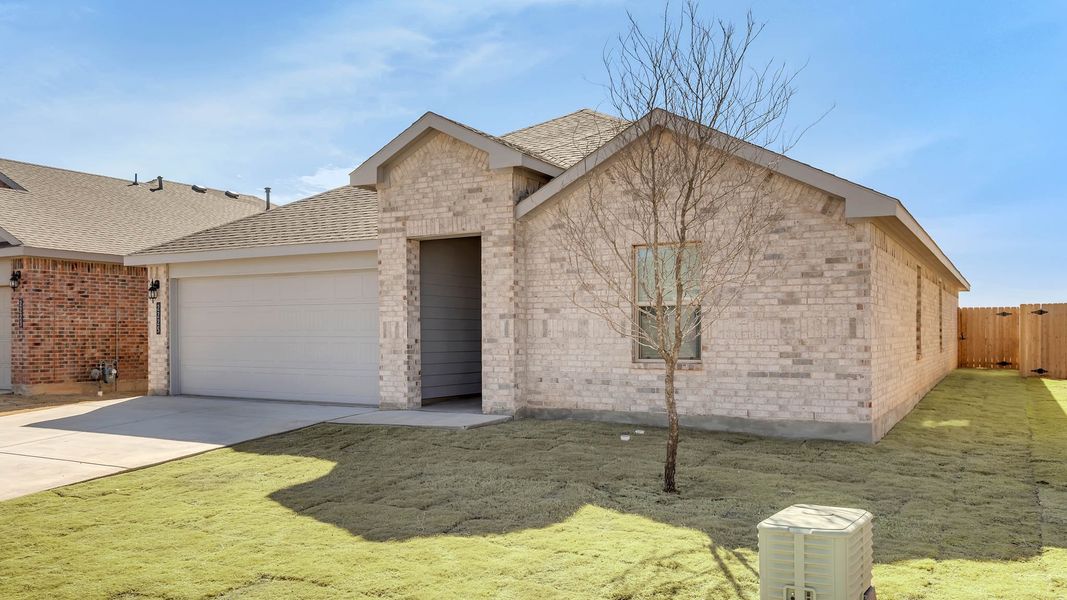 Front exterior of a new home in Allen Farms, Lubbock, TX, highlighting curb appeal (Image 16).