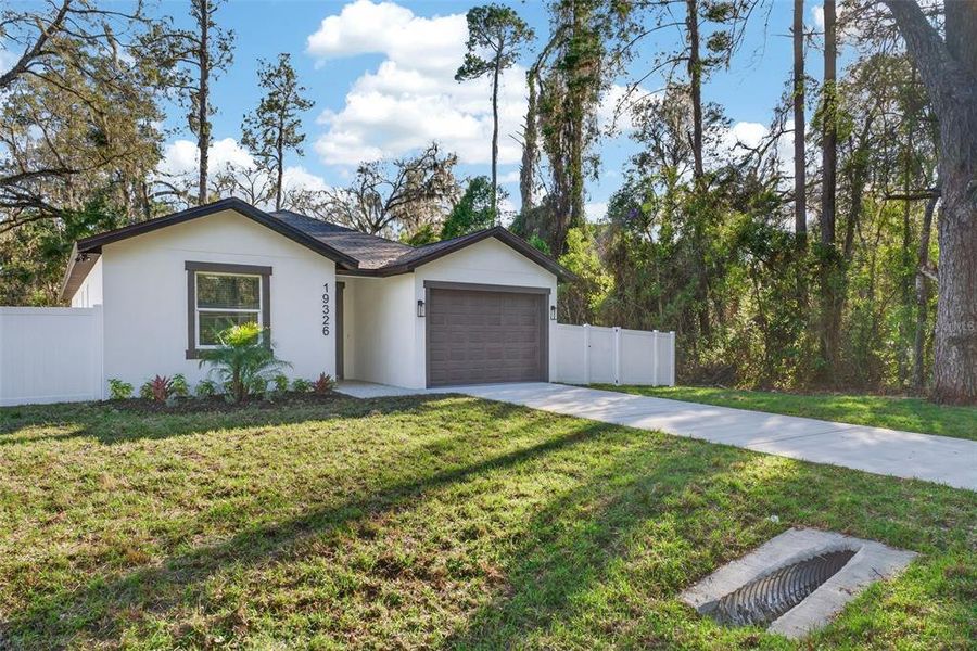 Front exterior of a new home in , Brooksville, FL, highlighting curb appeal (Image 31).