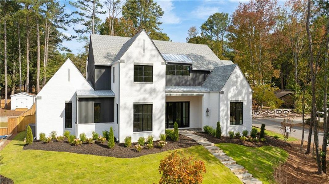 Front exterior of a new home in , Alpharetta, GA, highlighting curb appeal (Image 1).