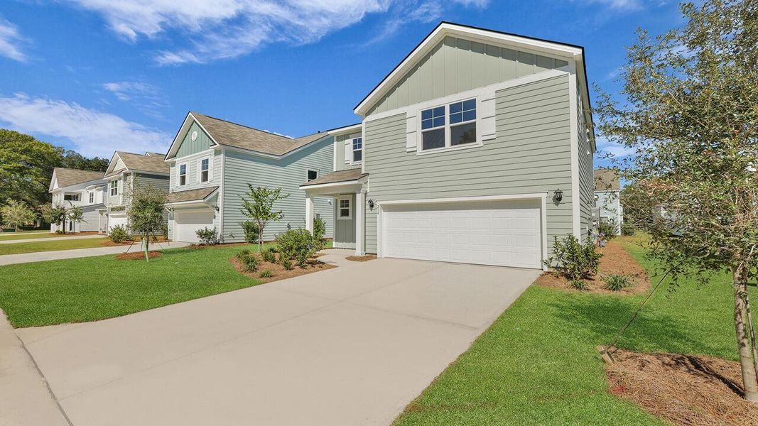 Front exterior of a new home in Founders Corner, Summerville, SC, highlighting curb appeal (Image 16).